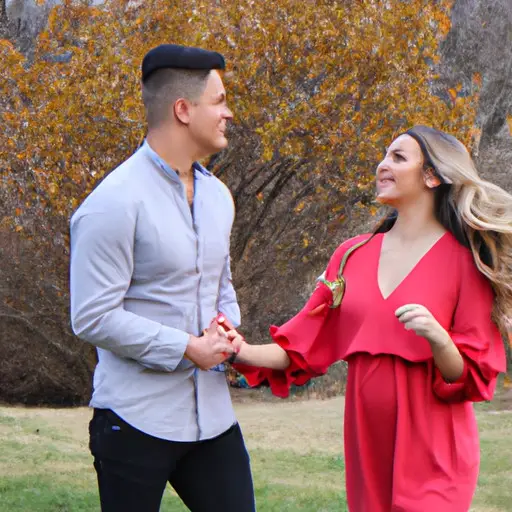 An image showcasing a joyful couple in their mid-20s, holding hands while strolling through a picturesque park