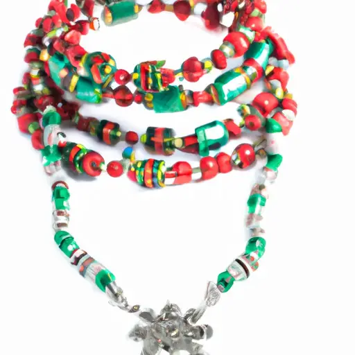 An image of a delicate silver necklace adorned with a dainty snowflake pendant, accompanied by a stack of vibrant, handcrafted beaded bracelets in varying shades of red and green, showcasing unique patterns and intricate designs