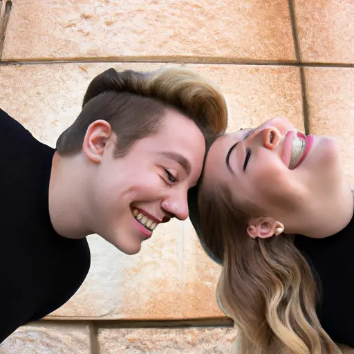 An engaging image that showcases a couple playfully posing with their faces close together, cleverly using perspective to make them appear the same height