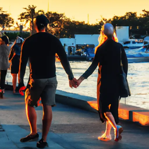 An image that portrays a couple in their late 20s strolling hand-in-hand along a serene waterfront, bathed in the warm glow of a setting sun, radiating a sense of happiness and contentment