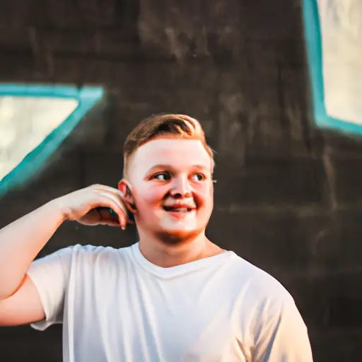 E an image capturing a person standing against a vibrant graffiti-covered wall, basking in warm sunlight, with an infectious smile and confident body language, radiating approachability and charisma for a dating profile