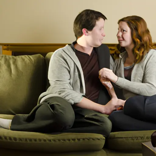 An image showcasing a couple sitting face-to-face on a cozy couch, effortlessly engaged in deep conversation